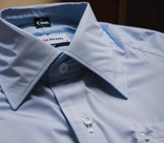 The difference between cotton and cotton/polyester shirt